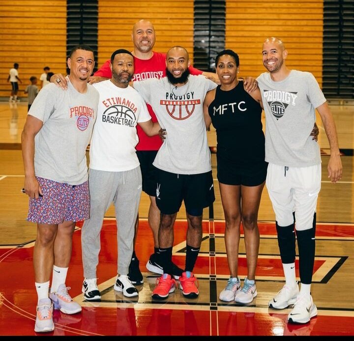 Coach Peters with the JMac Camp on the court at Etiwanda High School.