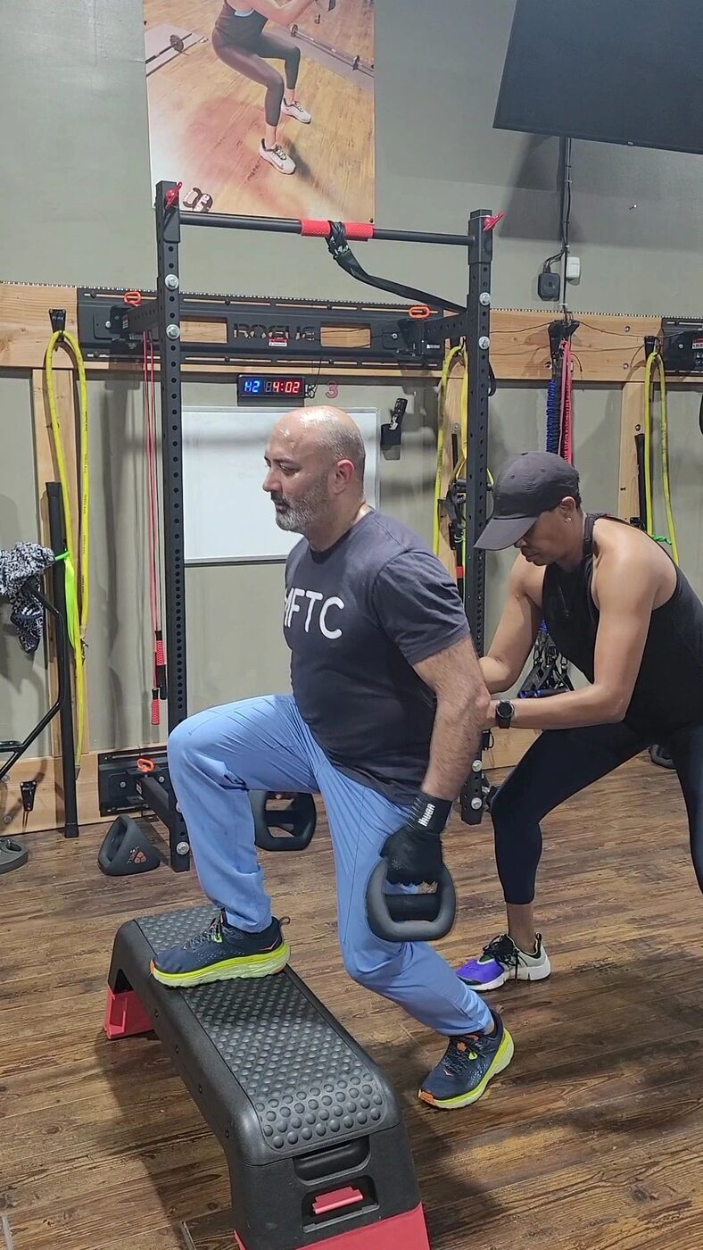 A client during a one-on-one session at Marathon Fitness Training Center.