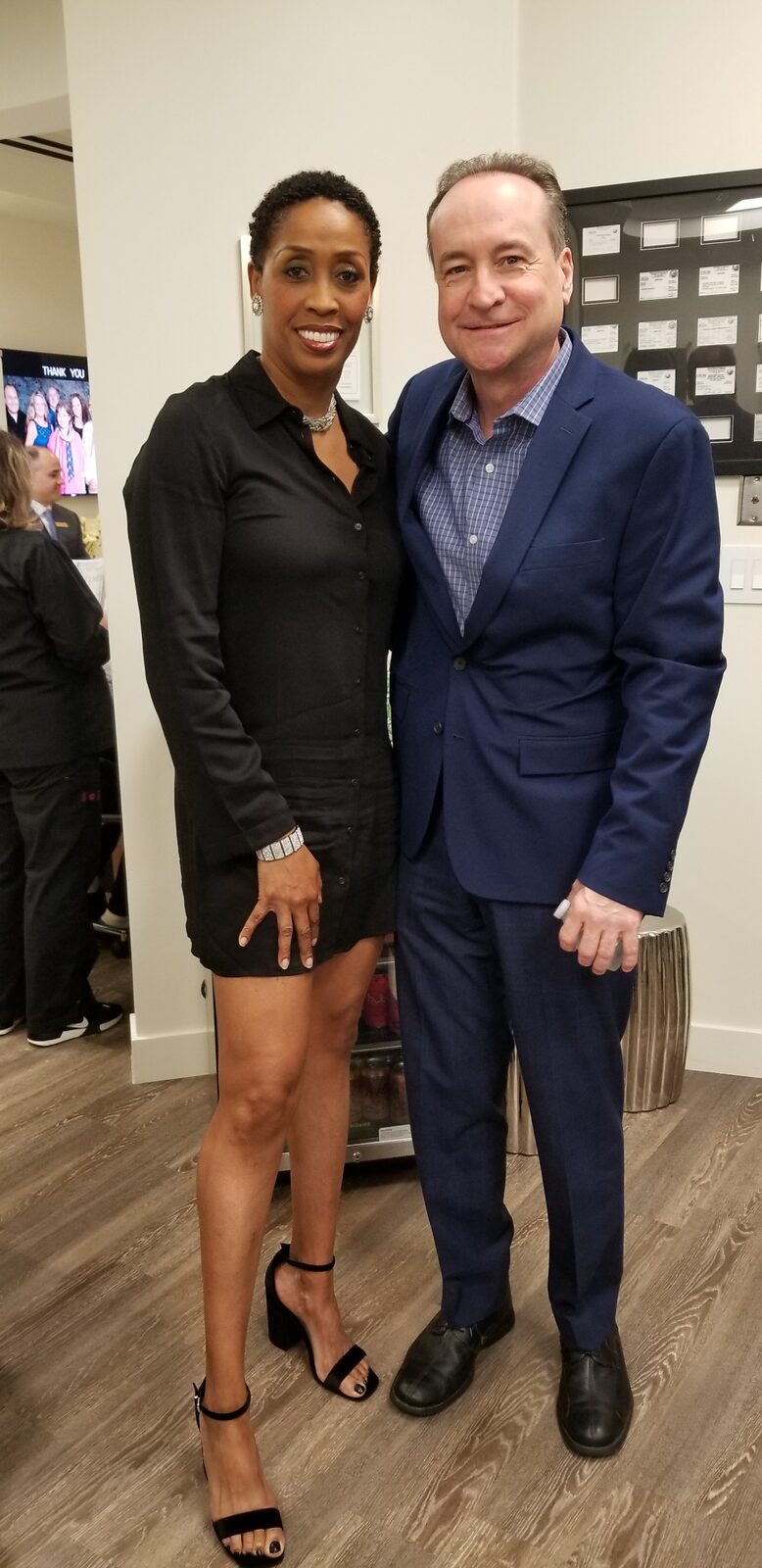 Coach Peters with one of the Cunning Dental Group doctors.