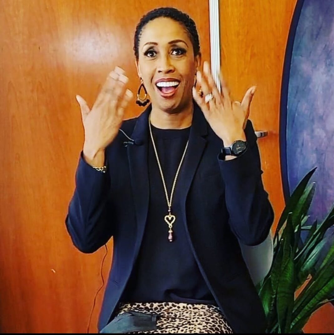 Coach Peters sharing her excitement about her new smile.